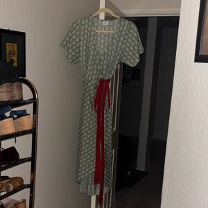 Elegant Green wrap Dress with Red Accent